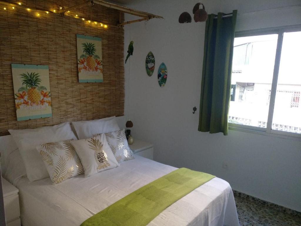 Postel nebo postele na pokoji v ubytování Wonder Rooms Nerja Guest House