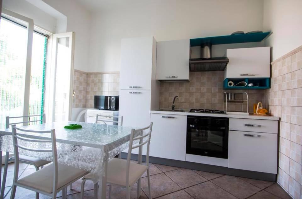 Kuchyň nebo kuchyňský kout v ubytování B&B "Posta di Colonna"