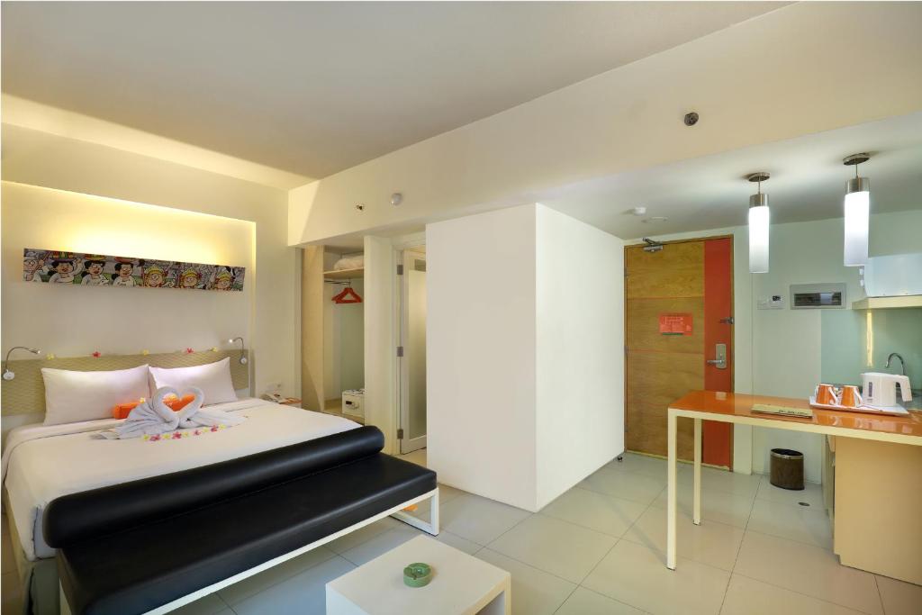 Kuchyň nebo kuchyňský kout v ubytování HARRIS Hotel & Residences Sunset Road