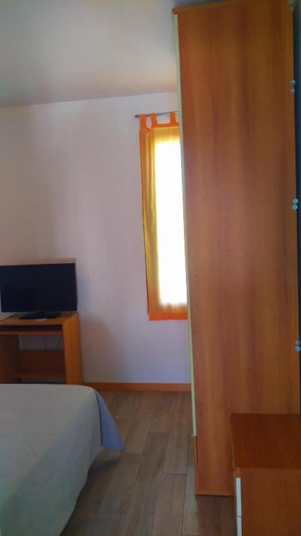 TV a/nebo společenská místnost v ubytování Al terminal
