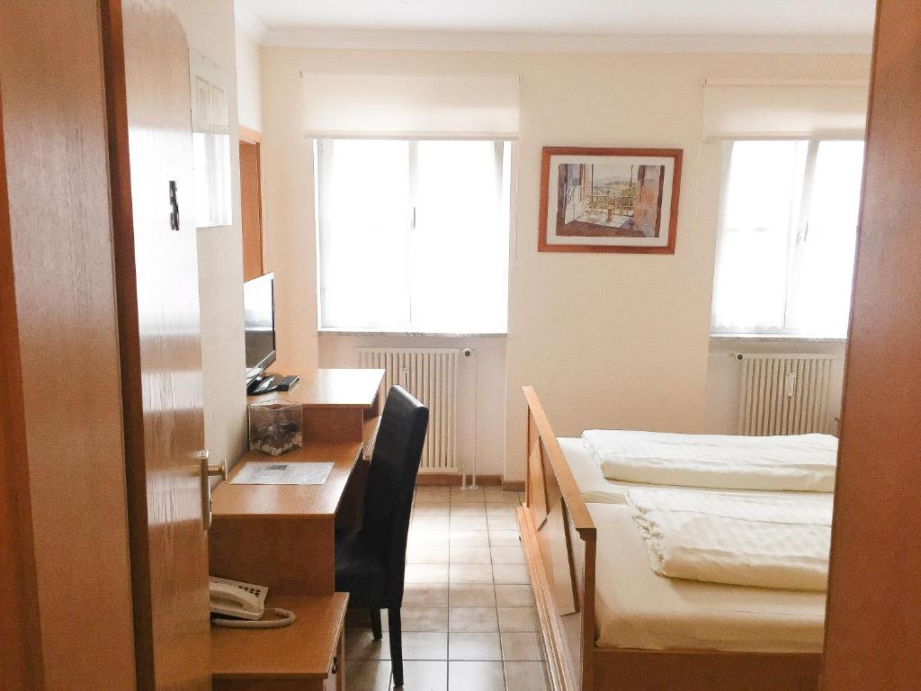 Postel nebo postele na pokoji v ubytování Pension Mona Lisa