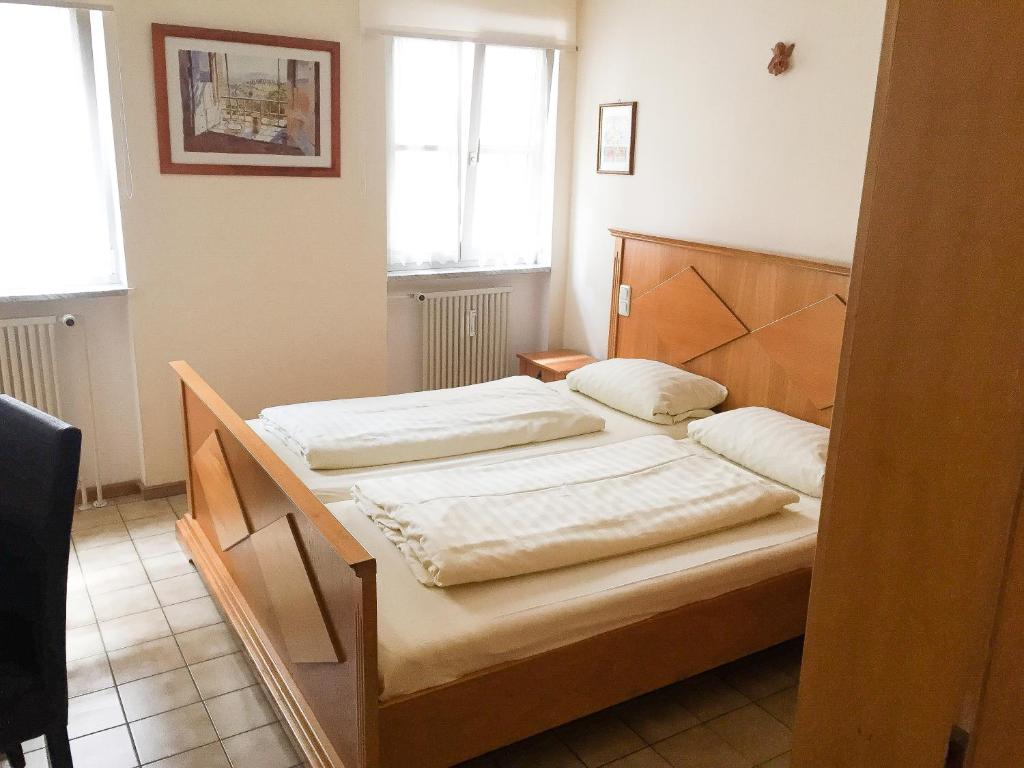 Postel nebo postele na pokoji v ubytování Pension Mona Lisa