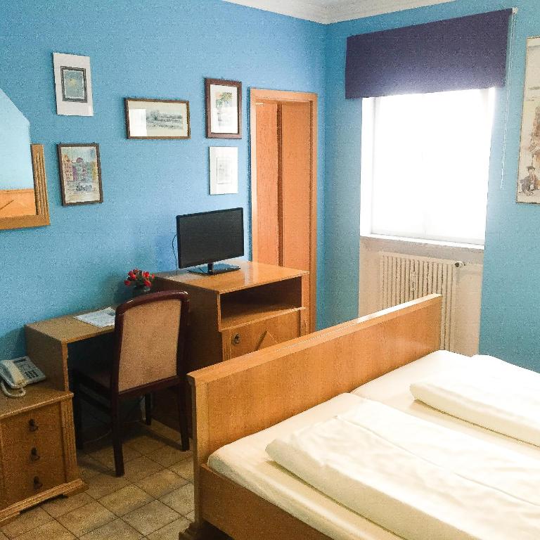 Postel nebo postele na pokoji v ubytování Pension Mona Lisa