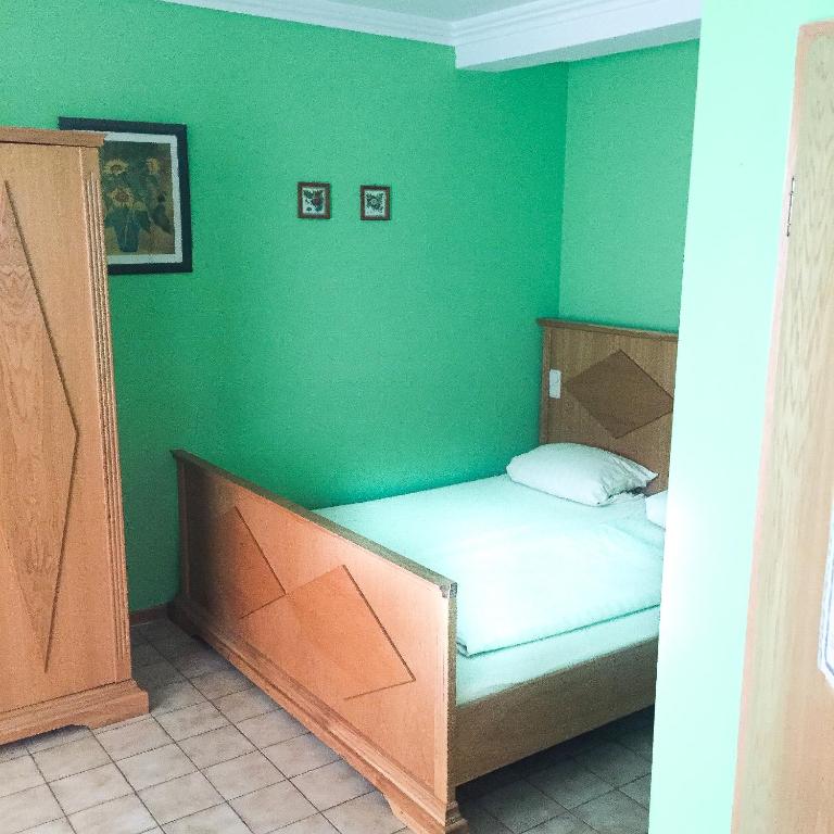 Postel nebo postele na pokoji v ubytování Pension Mona Lisa