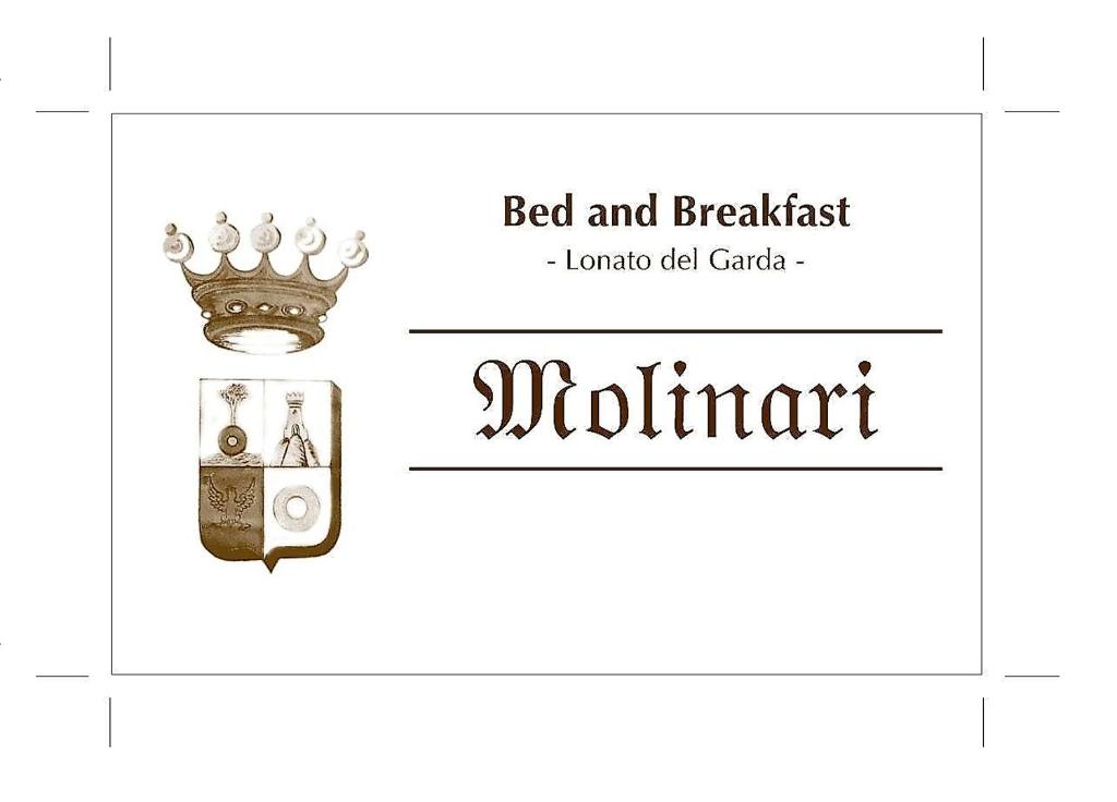 a sign for a bed and breakfast with a crown on it at B&B MOLINARI in Lonato del Garda