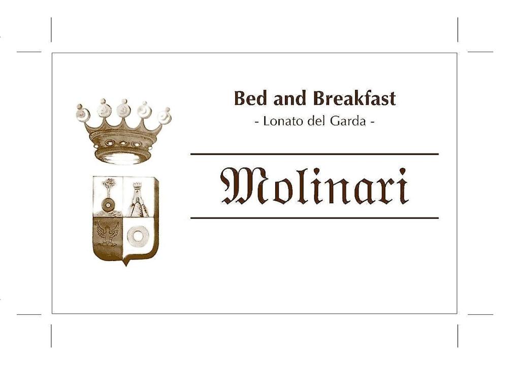 a sign for a bed and breakfast with a crown on it at B&B MOLINARI in Lonato