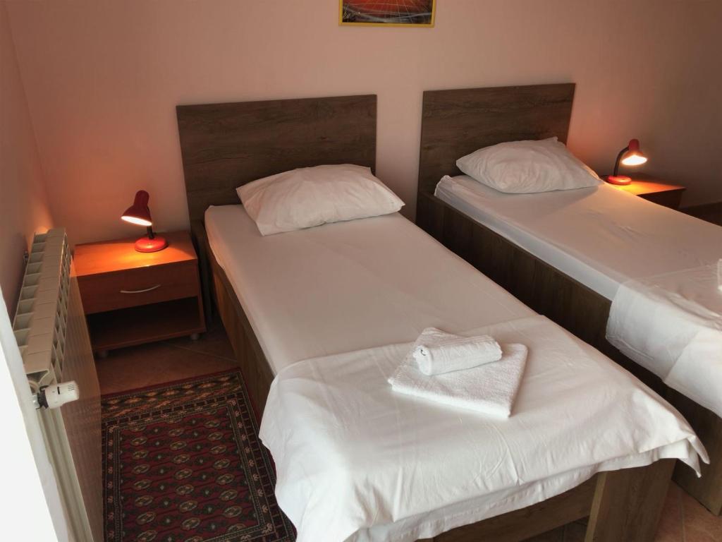 Postel nebo postele na pokoji v ubytování Guest House Ivo