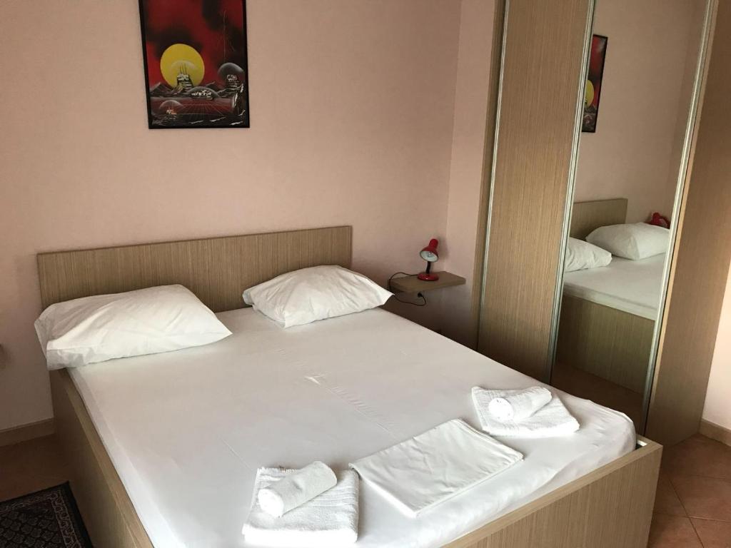Postel nebo postele na pokoji v ubytování Guest House Ivo