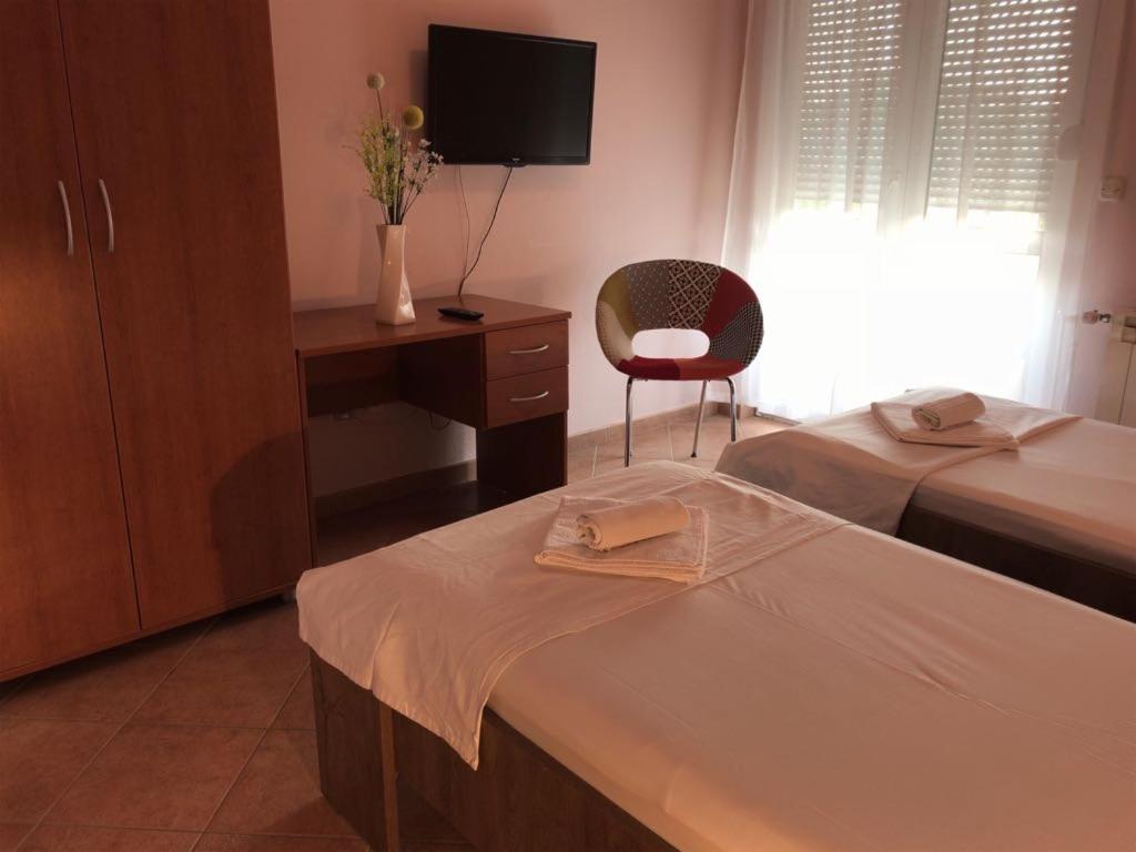 Postel nebo postele na pokoji v ubytování Guest House Ivo