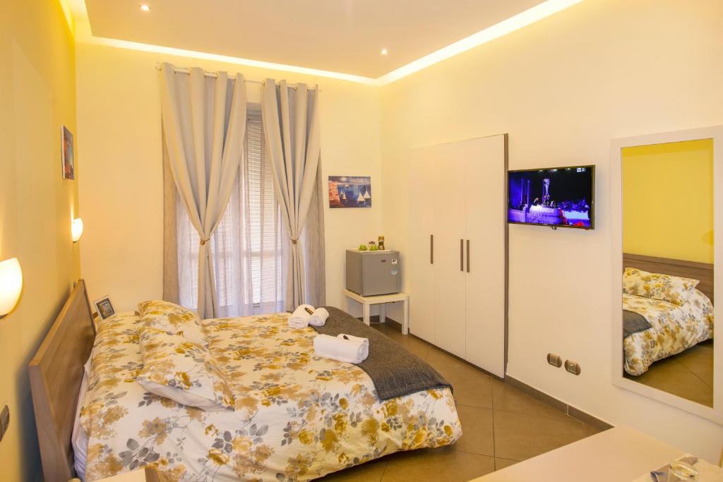 Postel nebo postele na pokoji v ubytování Casa Aristide