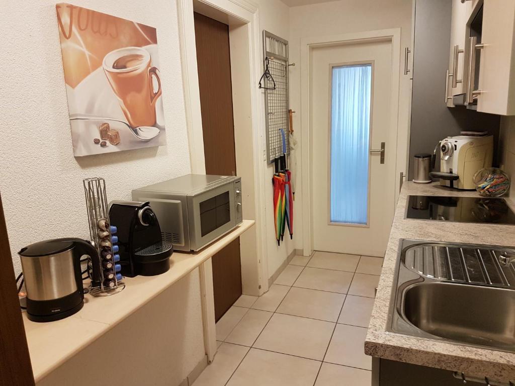 Kuchyň nebo kuchyňský kout v ubytování Niros Bed & Breakfast