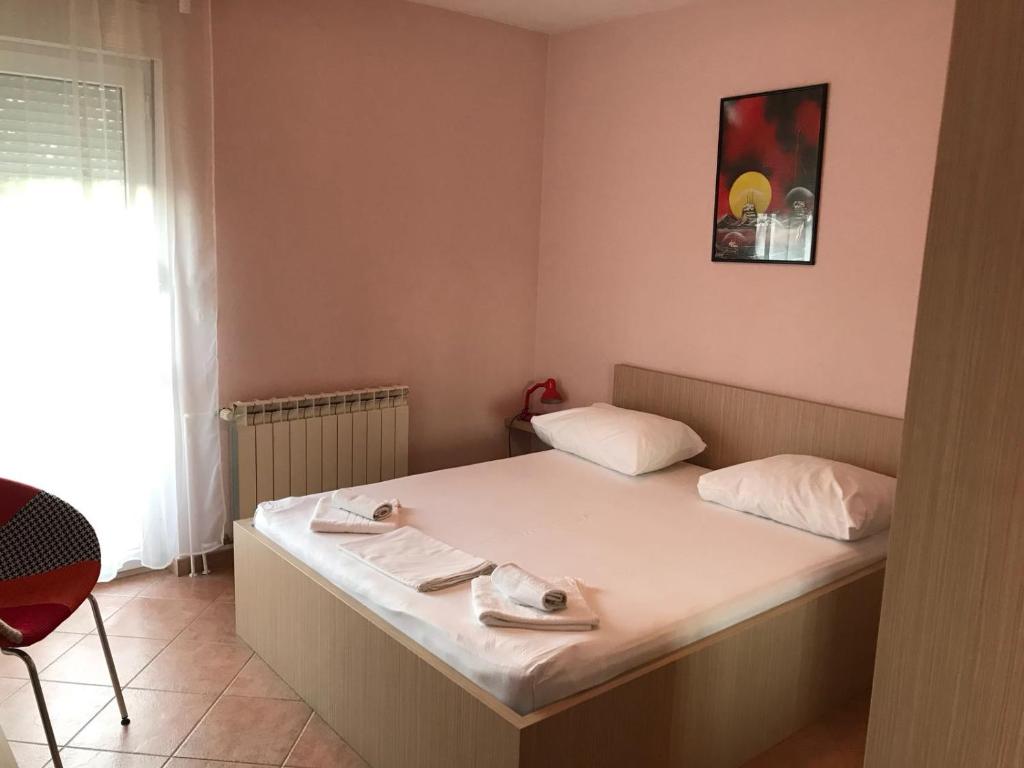 Postel nebo postele na pokoji v ubytování Guest house IVO