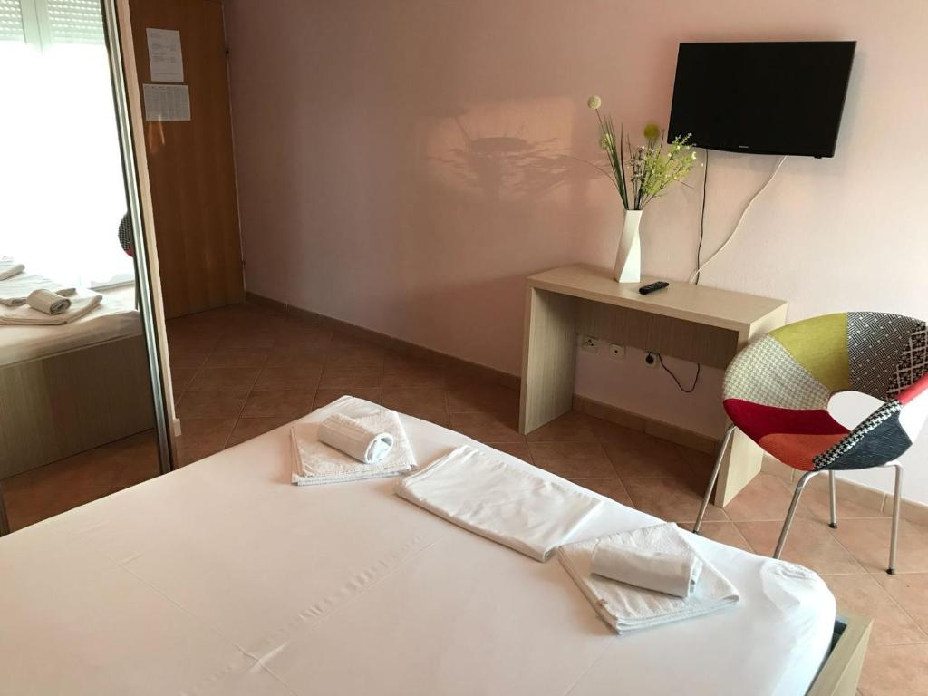 Postel nebo postele na pokoji v ubytování Guest house IVO