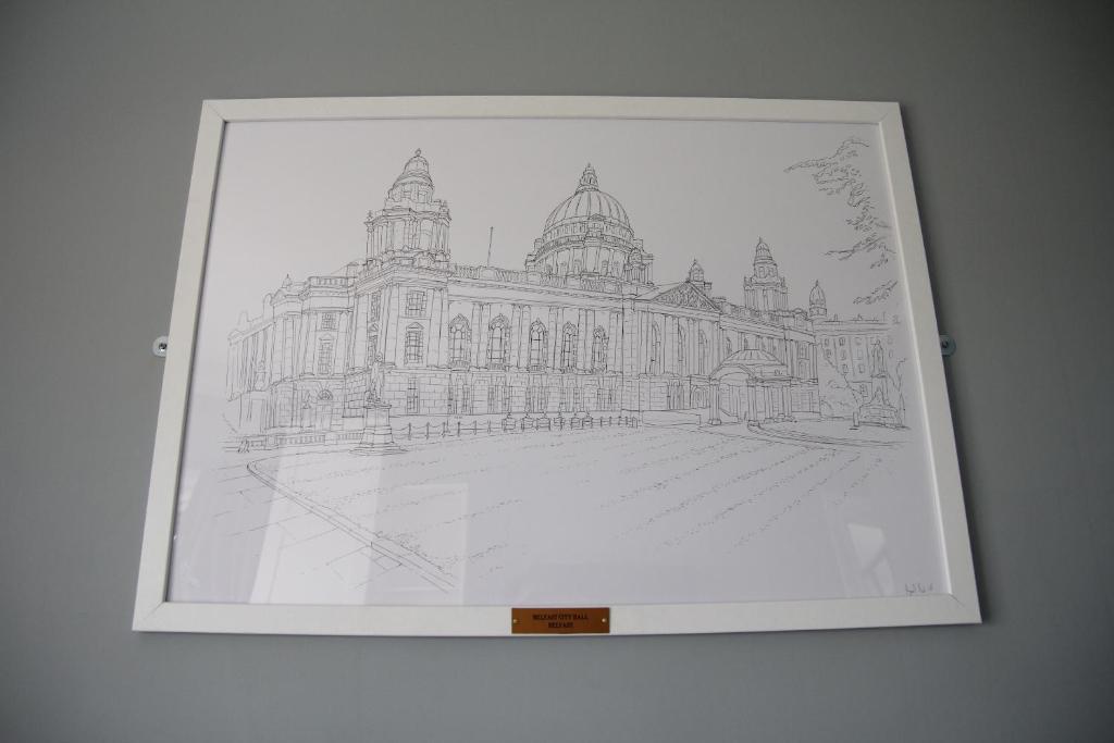 a drawing of a building on a wall at Greenmount Bed and Breakfast in Belfast