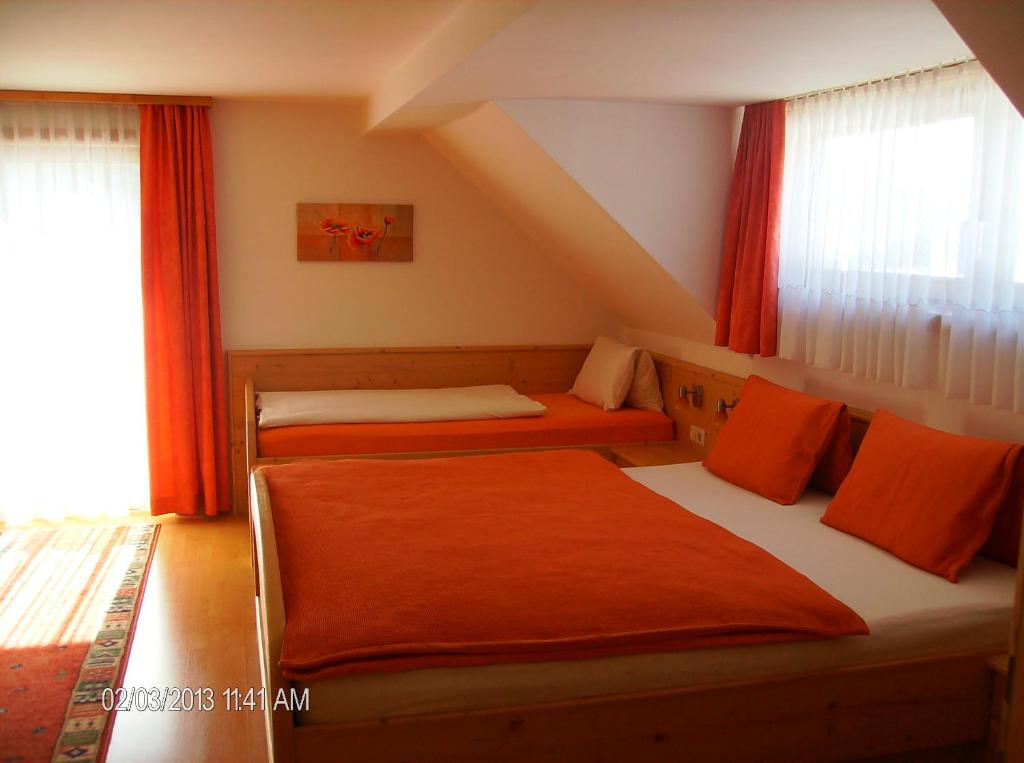 Postel nebo postele na pokoji v ubytování Binderhof