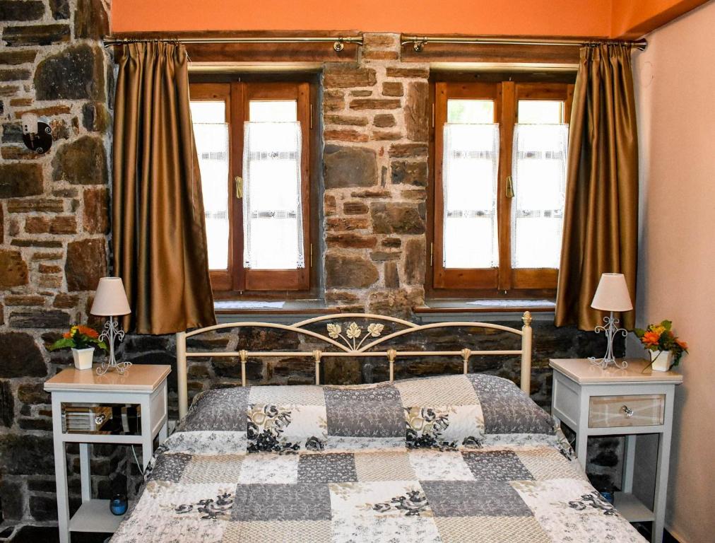 Postel nebo postele na pokoji v ubytování Guest House "Aspasia"