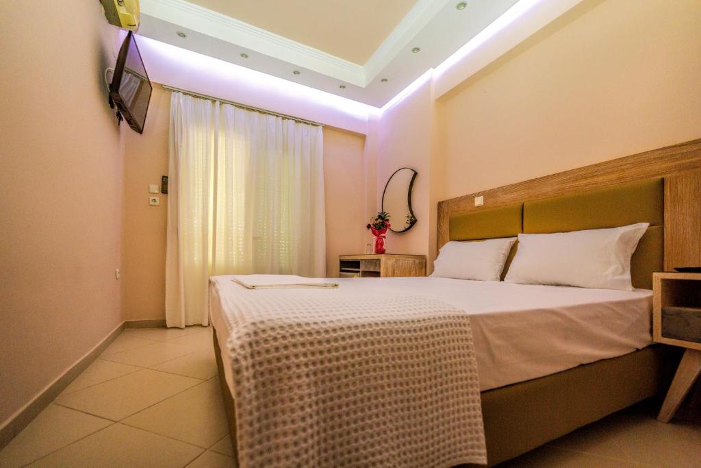 Postel nebo postele na pokoji v ubytování Le Monde SeaView Suites