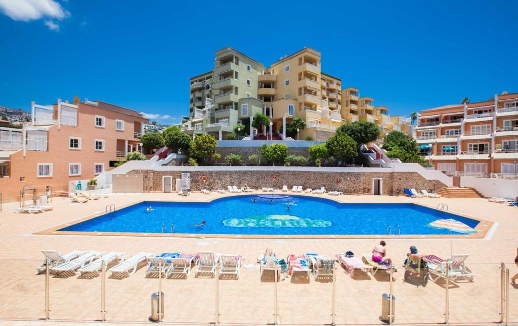 Bazén v ubytovaní Bonito apartamento Complejo Orlando alebo v jeho blízkosti