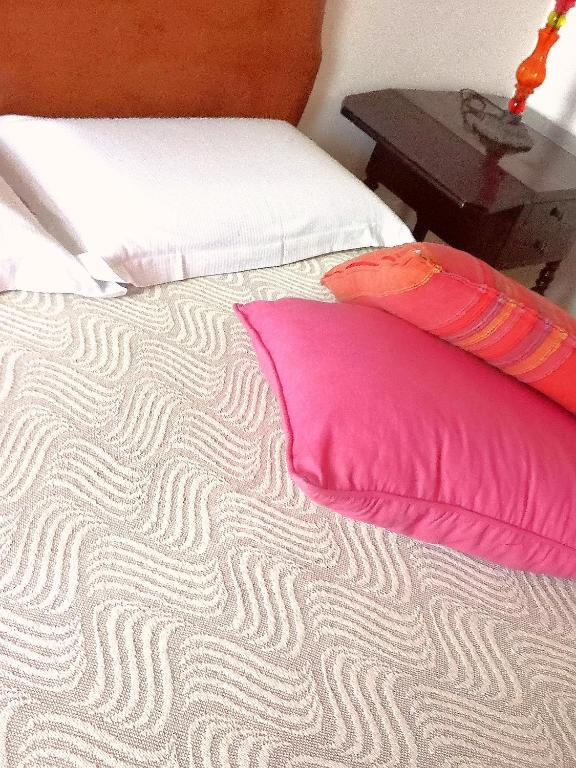 A bed or beds in a room at Cicicocó