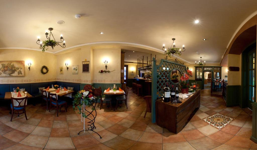 Restaurace v ubytování Neu Heidelberg - Guesthouse & Apartments