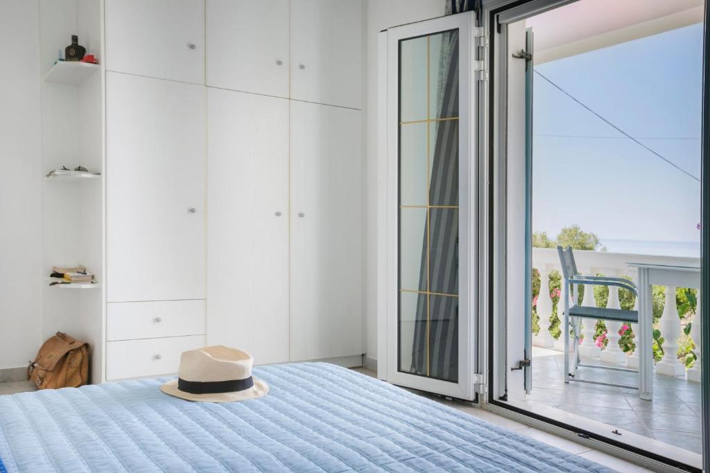 Postel nebo postele na pokoji v ubytování Vivian Apartments