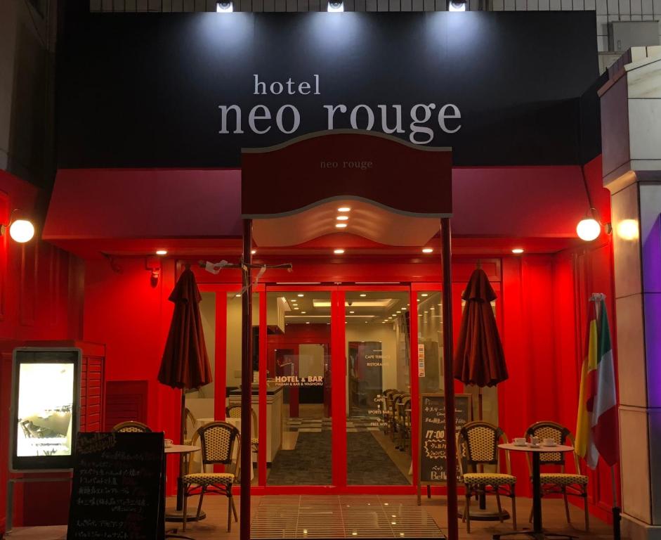 a restaurant with a sign that reads hotel neo rosie at Hotel Neo Rouge in Tokyo