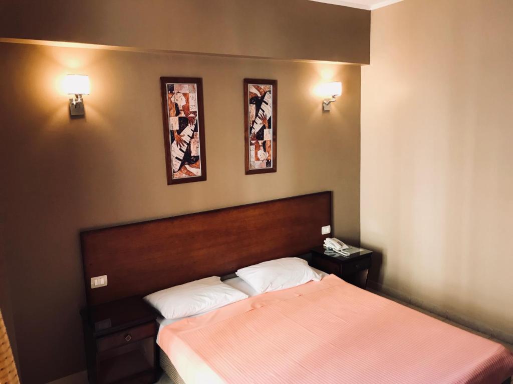 Postel nebo postele na pokoji v ubytování Florida Hotel North Coast