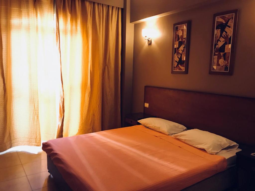 Postel nebo postele na pokoji v ubytování Florida Hotel North Coast