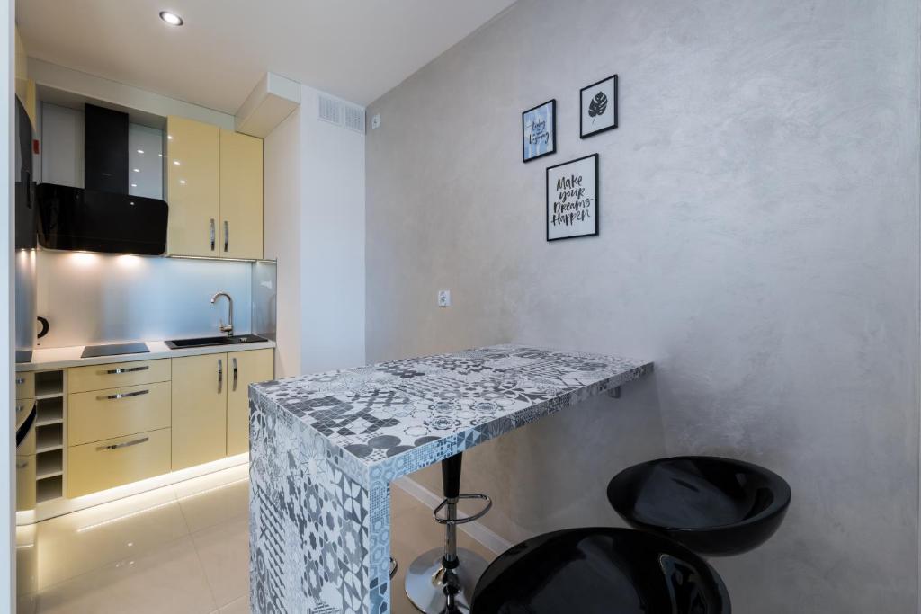 Kuchyňa alebo kuchynka v ubytovaní Apartament Marina View