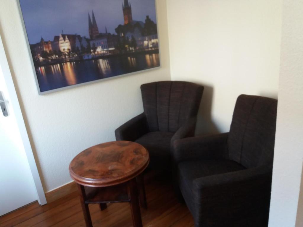 Posezení v ubytování Pensionszimmer Lützowzimmer