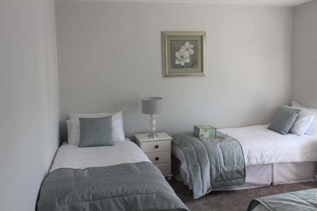 Postel nebo postele na pokoji v ubytování 5 mins walk to Carrick - Sleeps 12 - Off road parking - Modern house