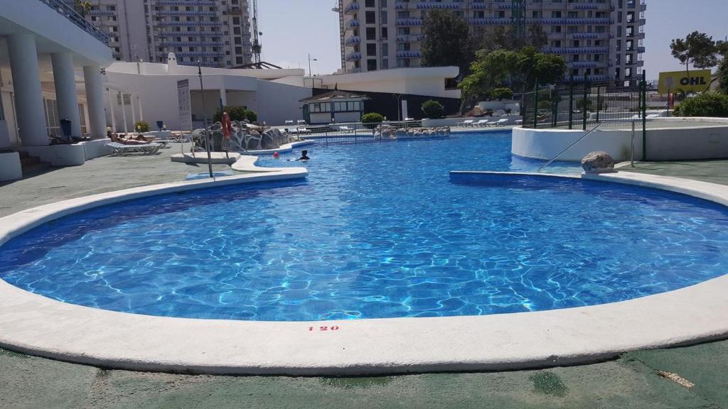 Bazén v ubytování Aphotel Paraiso del Sur in centro città, Wifi personale, vista mare con terrazza, ristoranti e Pub adiacenti, taxi e bus, atelier cura alla persona, Farmacia con medico nebo v jeho okolí