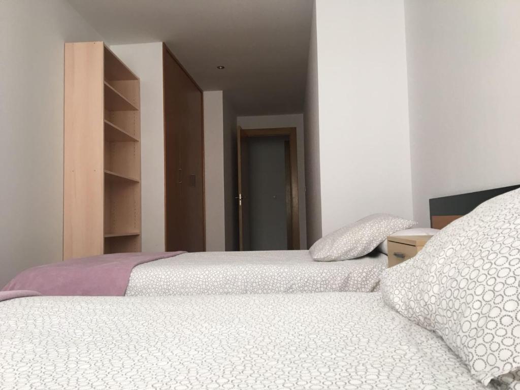 Posteľ alebo postele v izbe v ubytovaní Alojamiento moderno y céntrico