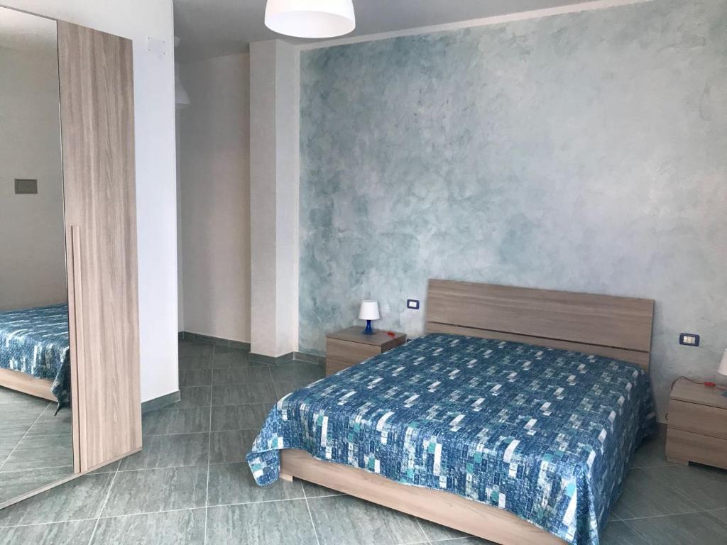 Postel nebo postele na pokoji v ubytování Affittacamere Villa Zelinda