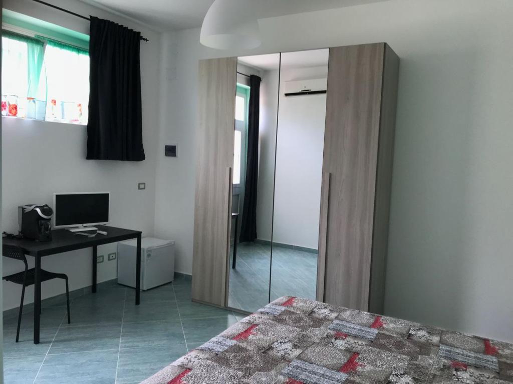 Postel nebo postele na pokoji v ubytování Affittacamere Villa Zelinda