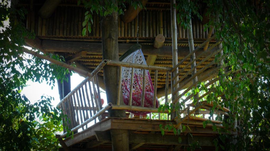 Balkón nebo terasa v ubytování Bukit Raya Guesthouse