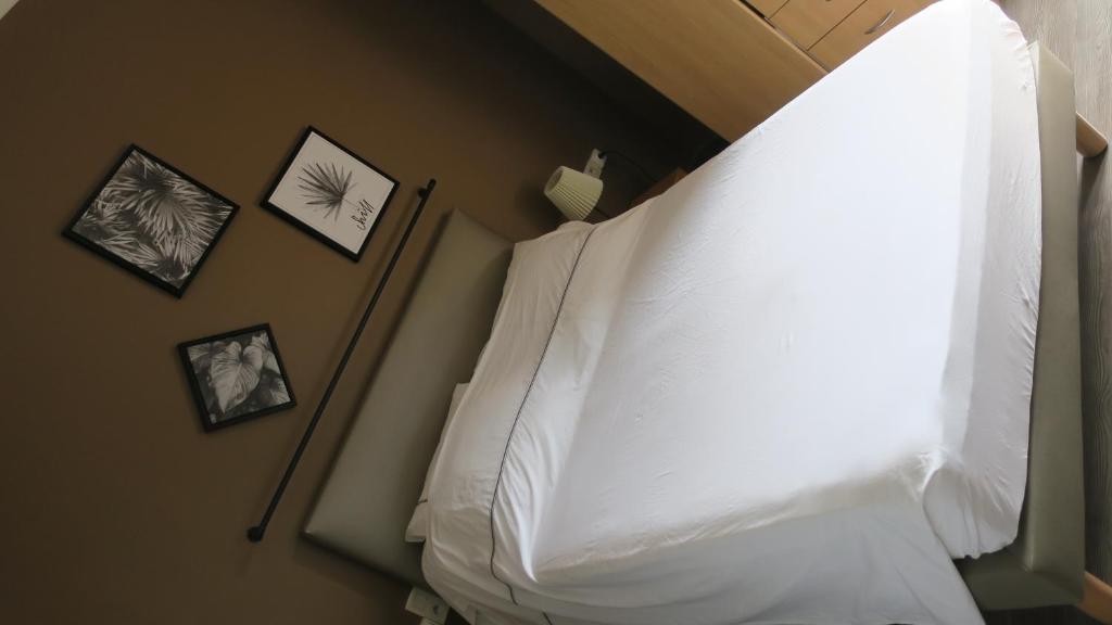 Postel nebo postele na pokoji v ubytování Au Remp'Arts
