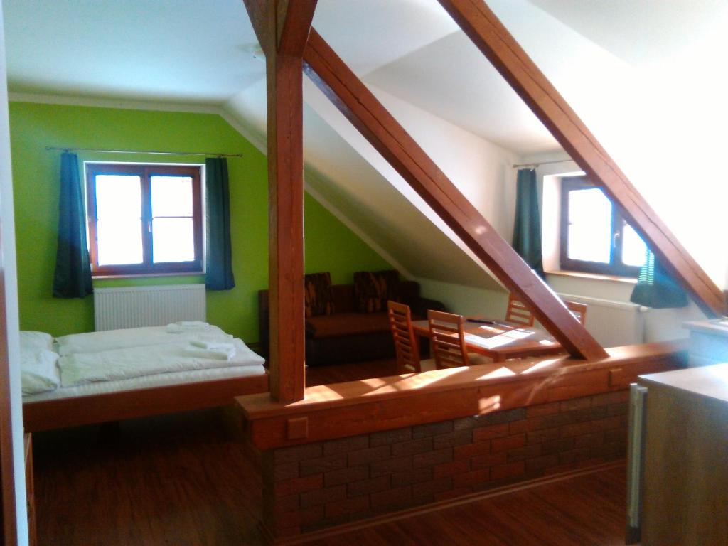 Postel nebo postele na pokoji v ubytování Penzion Planicka