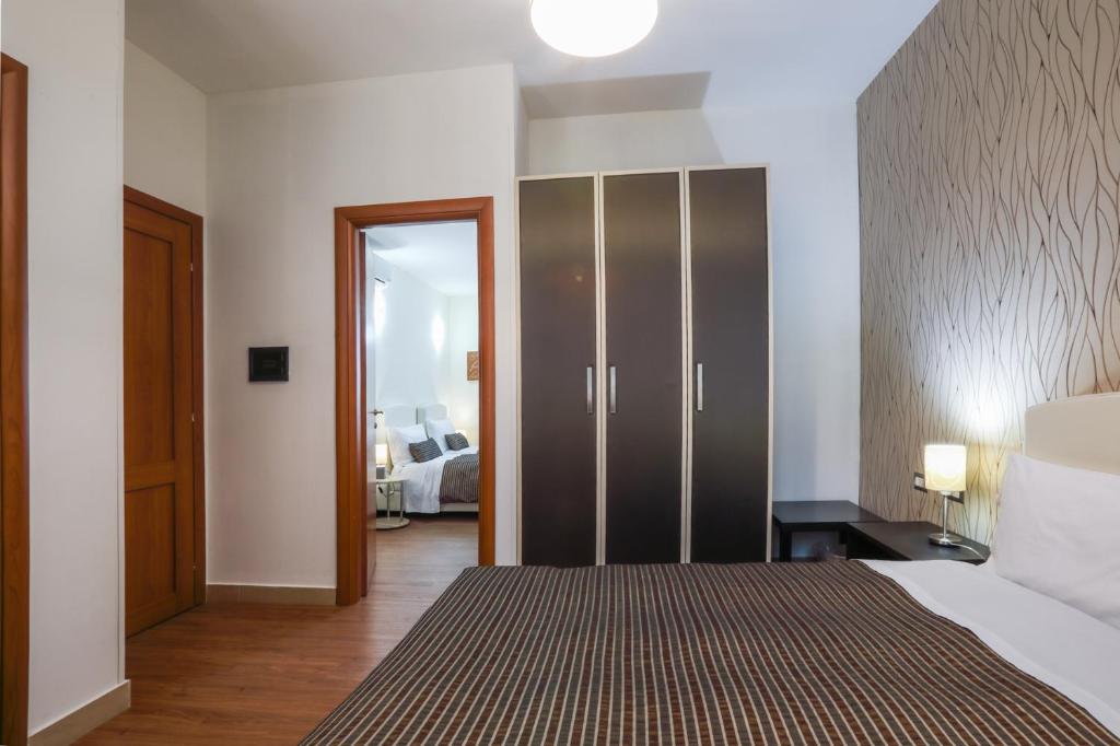 Postel nebo postele na pokoji v ubytování B&B Night&Day