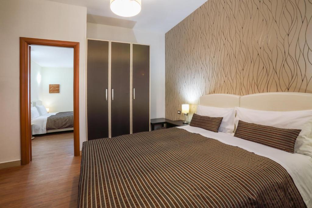 Postel nebo postele na pokoji v ubytování B&B Night&Day