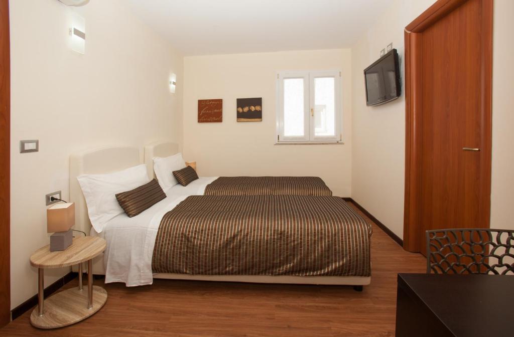 Postel nebo postele na pokoji v ubytování B&B Night&Day