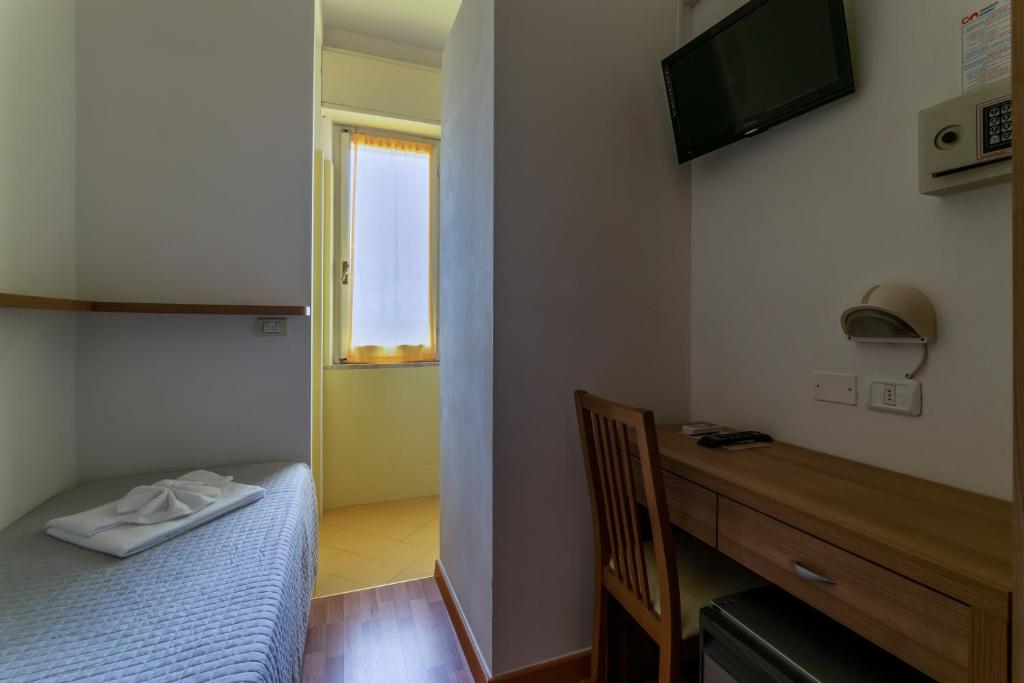 TV a/nebo společenská místnost v ubytování Hotel Stresa