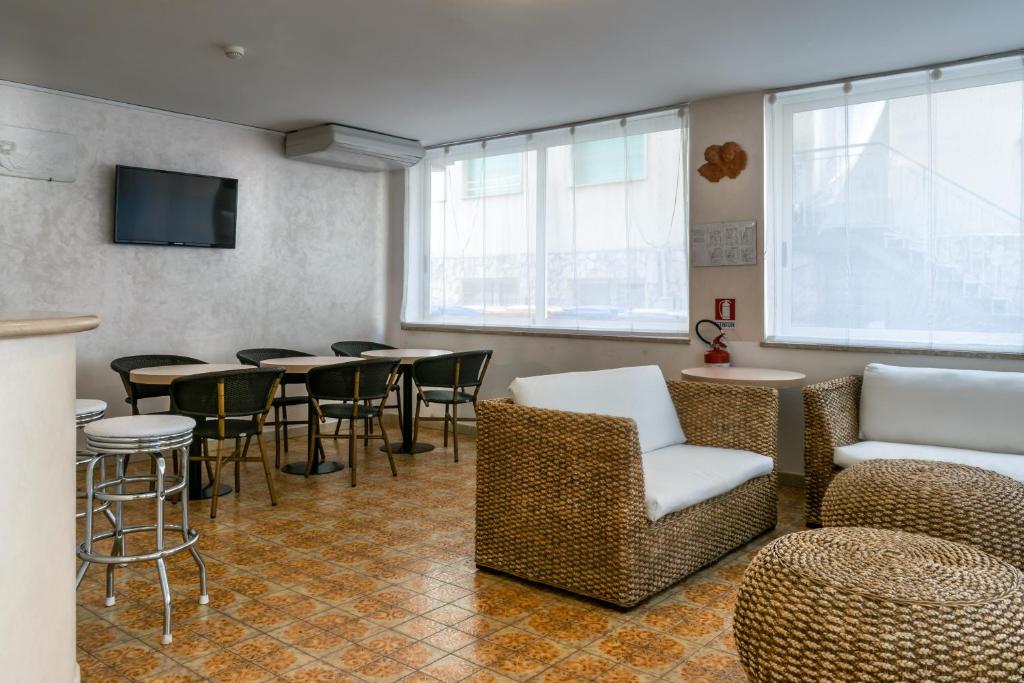TV a/nebo společenská místnost v ubytování Hotel Stresa