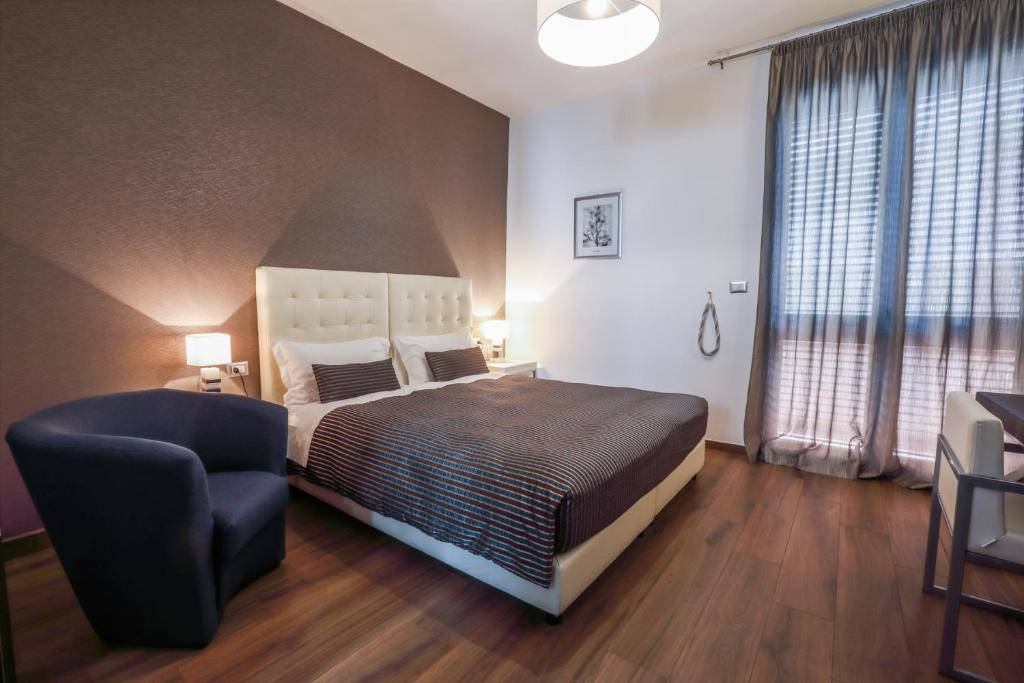 Postel nebo postele na pokoji v ubytování B&B Night&Day