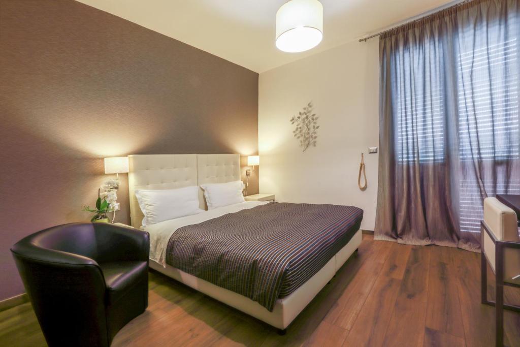 Postel nebo postele na pokoji v ubytování B&B Night&Day