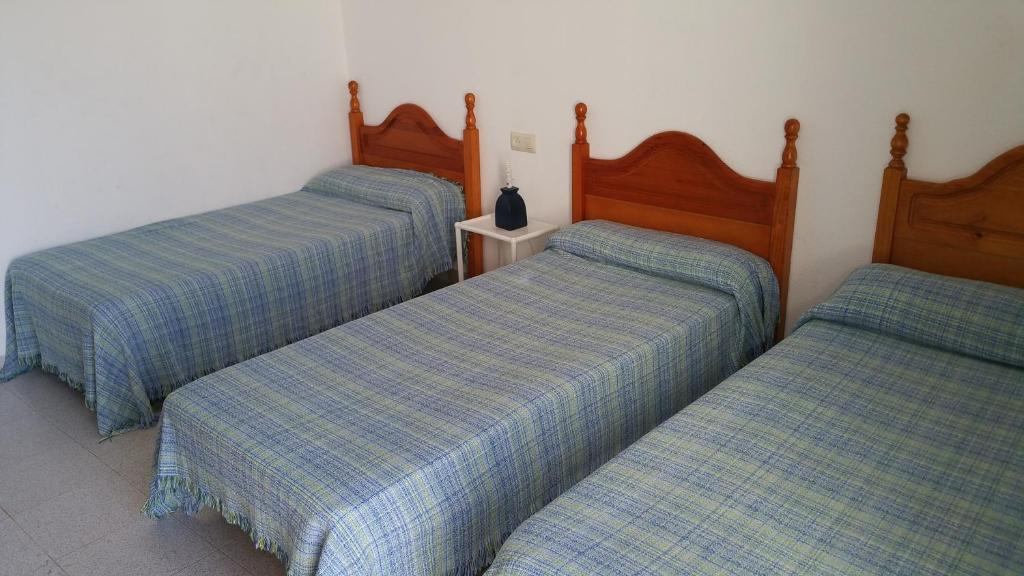 Postel nebo postele na pokoji v ubytování La Hoya
