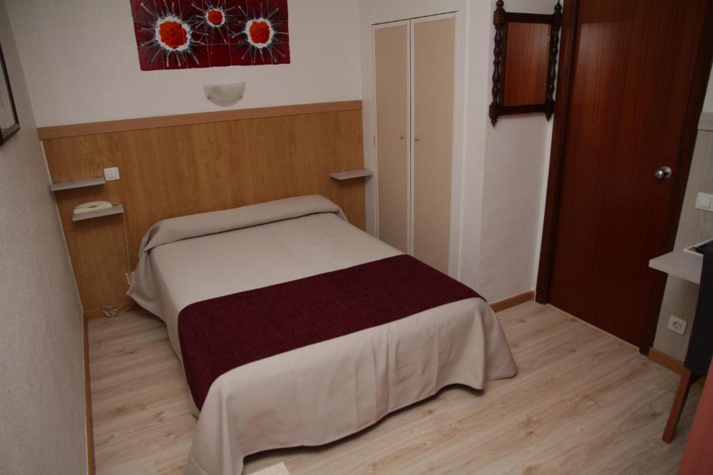 Posteľ alebo postele v izbe v ubytovaní Hotel Real Castellon