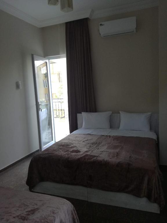 Postel nebo postele na pokoji v ubytování Guest House Sofia