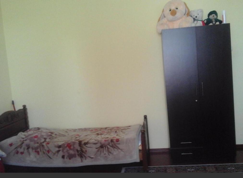 Postel nebo postele na pokoji v ubytování guest house ( guramishvili 19 )
