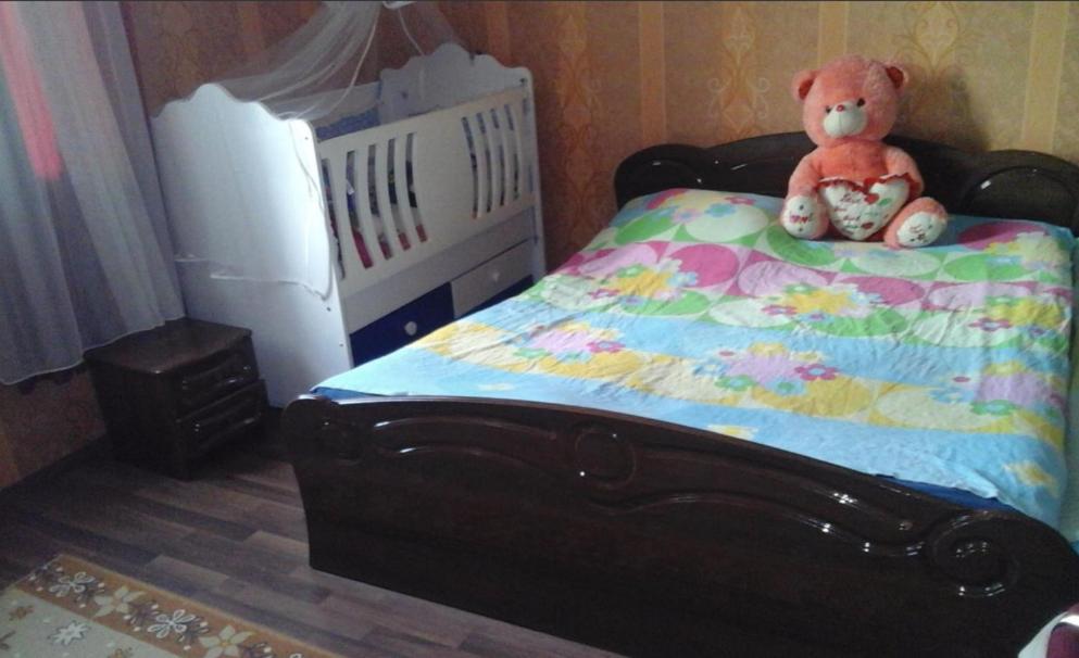 Postel nebo postele na pokoji v ubytování guest house ( guramishvili 19 )